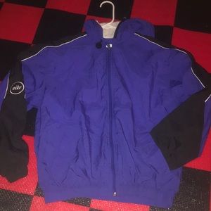 Royal blue and black Nike windbreaker with good